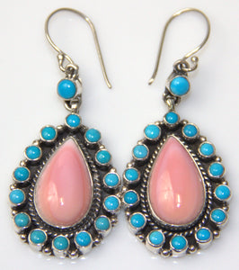 Conch/ round sleeping Beauty Turquoise earring.